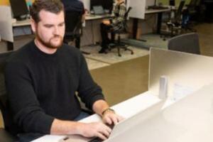 Man typing on a keyboard