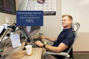 Man at a laptop with coffee